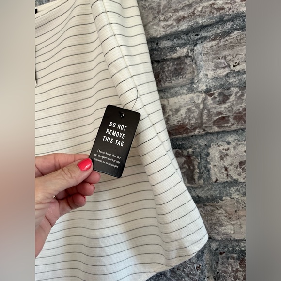 Express NWT cream with thin black stripe body suit. Waited to long to return - Picture 7 of 7